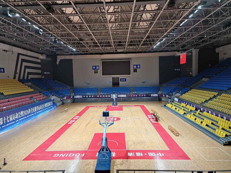 Empty standard basketball court in Fuqing Gymnasium, equipped with competition-grade LED sports lighting