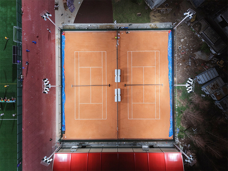 Outdoor tennis courts within the Wutaizha Stadium sports complex
