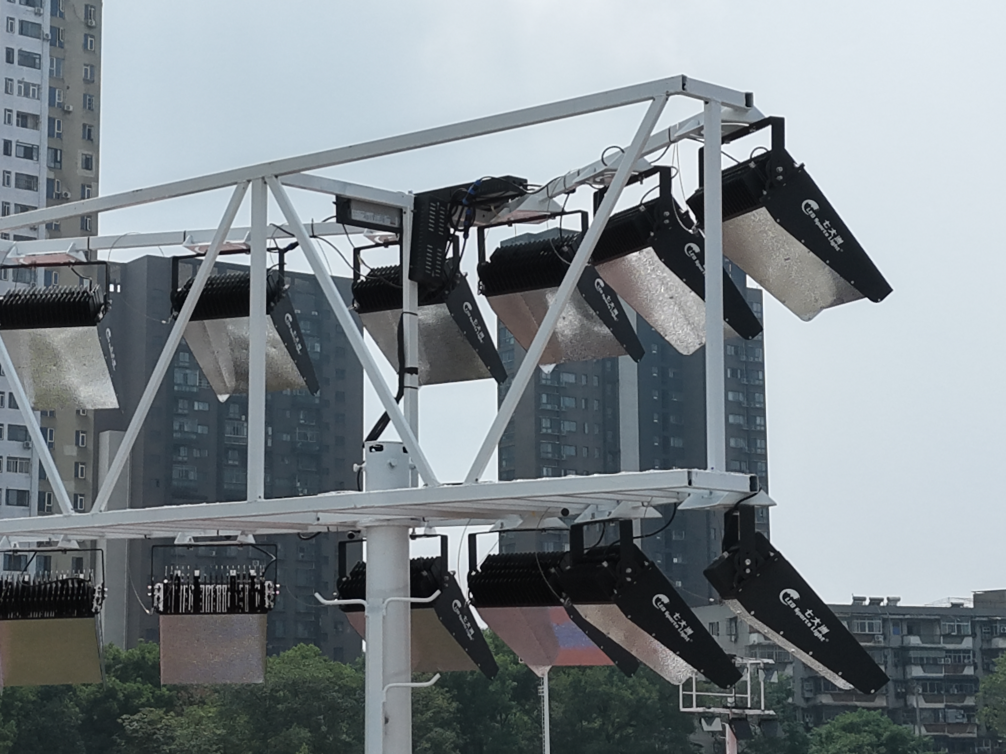 LED sports lighting fixtures installed on a stadium lighting structure