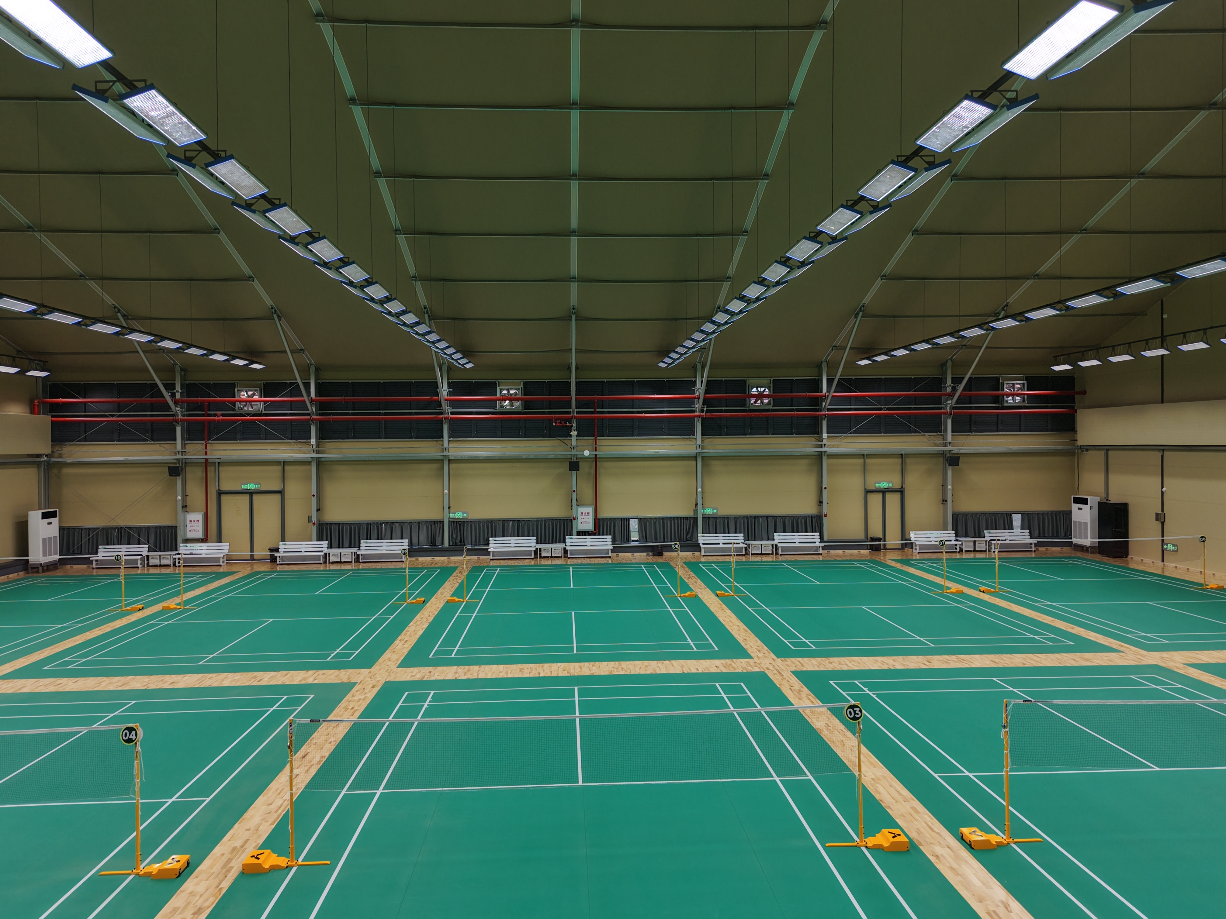 Indoor badminton courts at Wutaizha Stadium